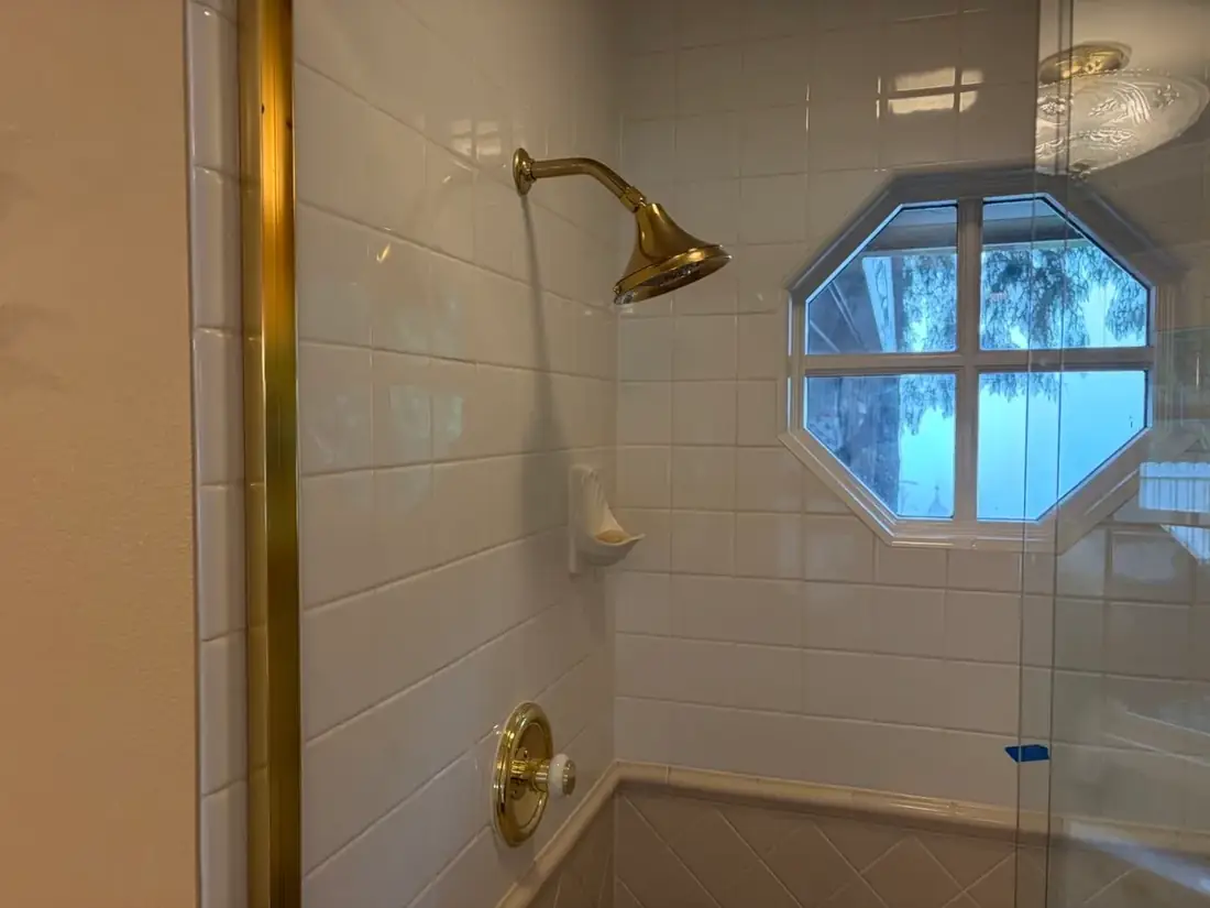 Green teal tile bathtub surround installation Oregon bathroom