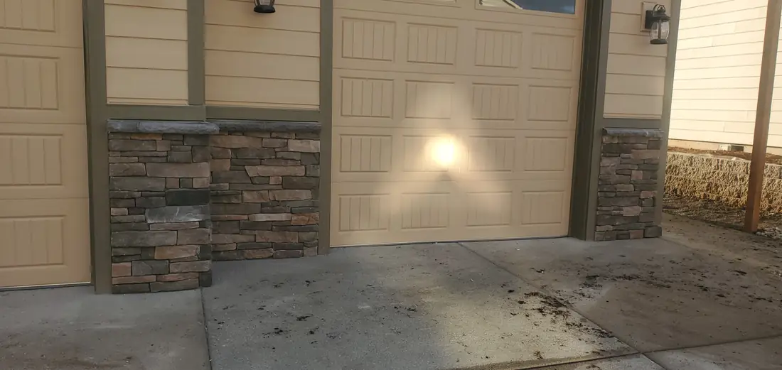 Thin stone veneer accent on exterior garage wall Oregon