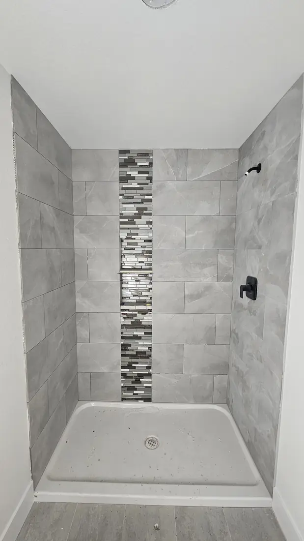 Large format gray tile shower and tub surround with niche Oregon