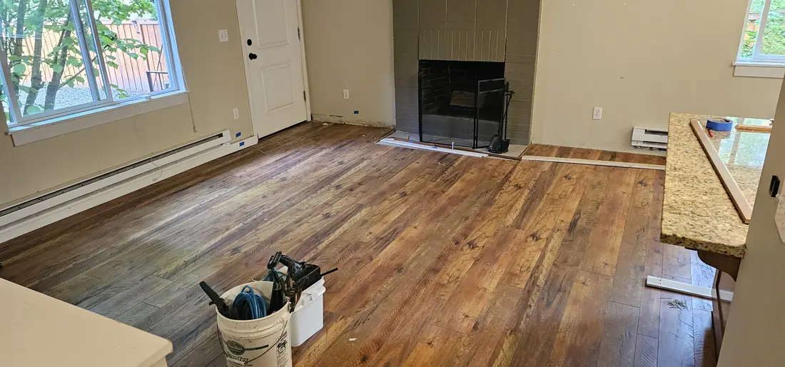 Interior remodel with hardwood floor and brick fireplace Oregon