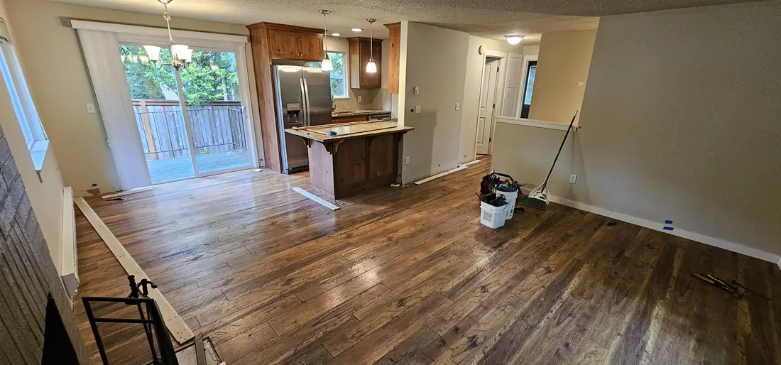 Open kitchen and living remodel with hardwood flooring Oregon