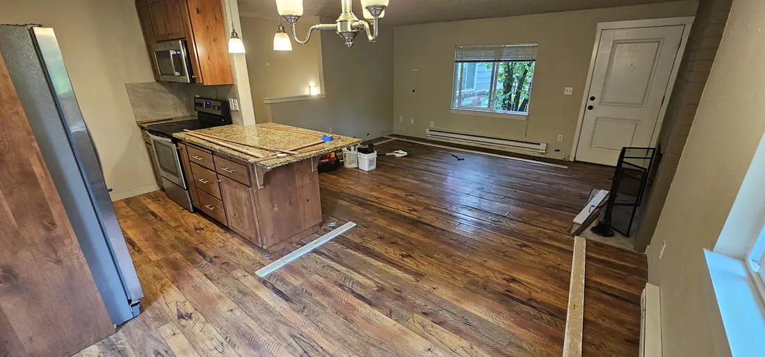 Kitchen remodel with island hardwood floor and chandelier Oregon