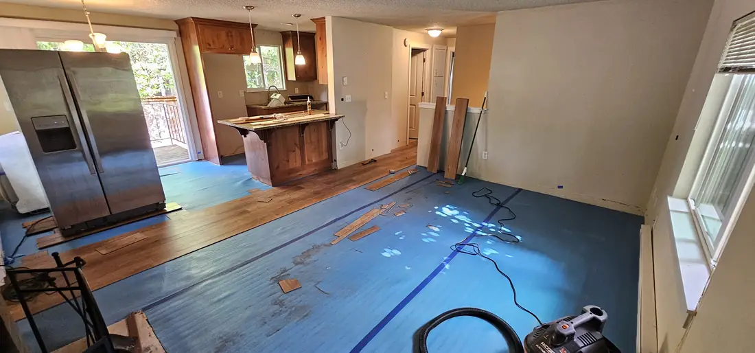 Living room remodel with new hardwood flooring installation Oregon